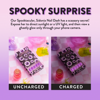 Expose Spooktacular Siconia short square press on nails to sunlight or UV to see a glow only through your phone camera.