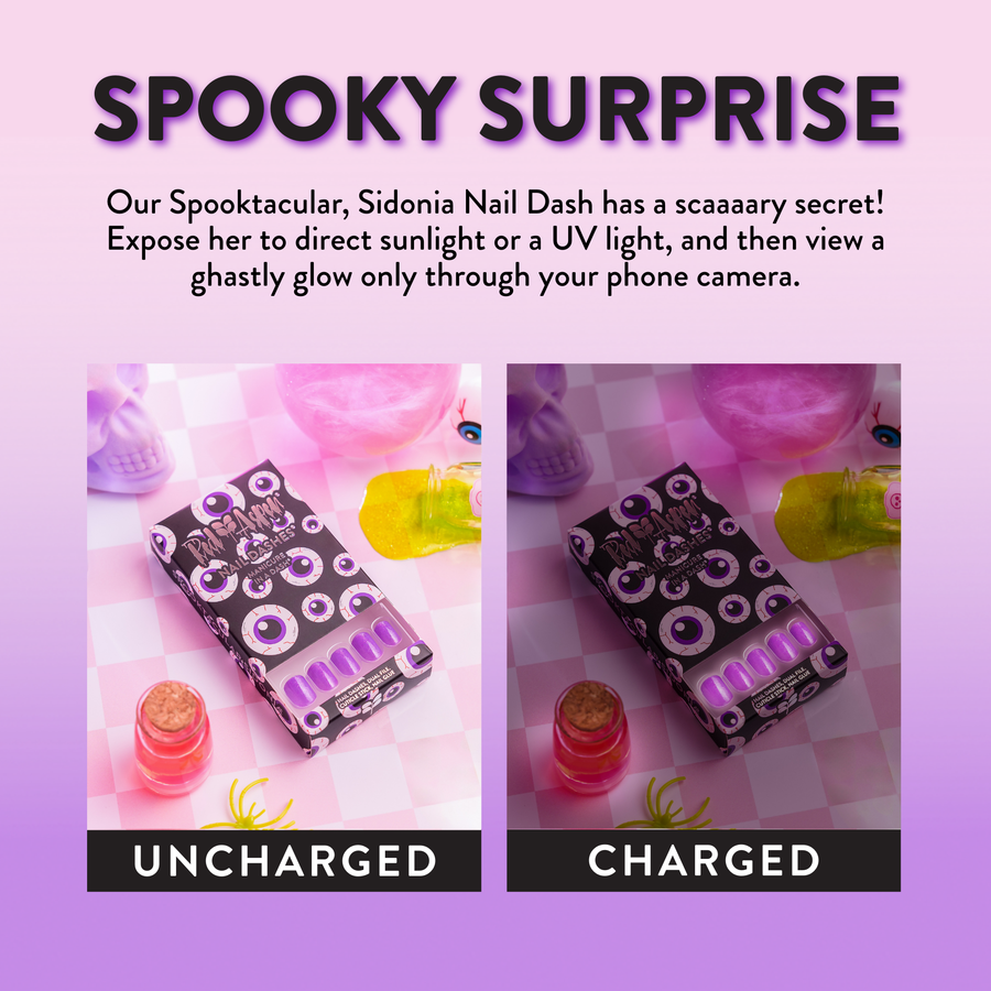 Expose Spooktacular Siconia short square press on nails to sunlight or UV to see a glow only through your phone camera.
